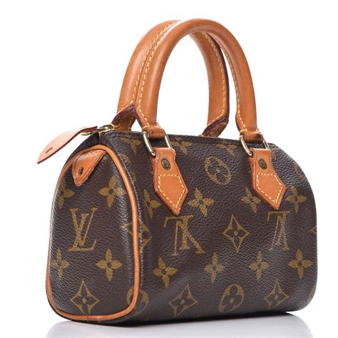 Louis Vuitton Monogram Mini HL Speedy .